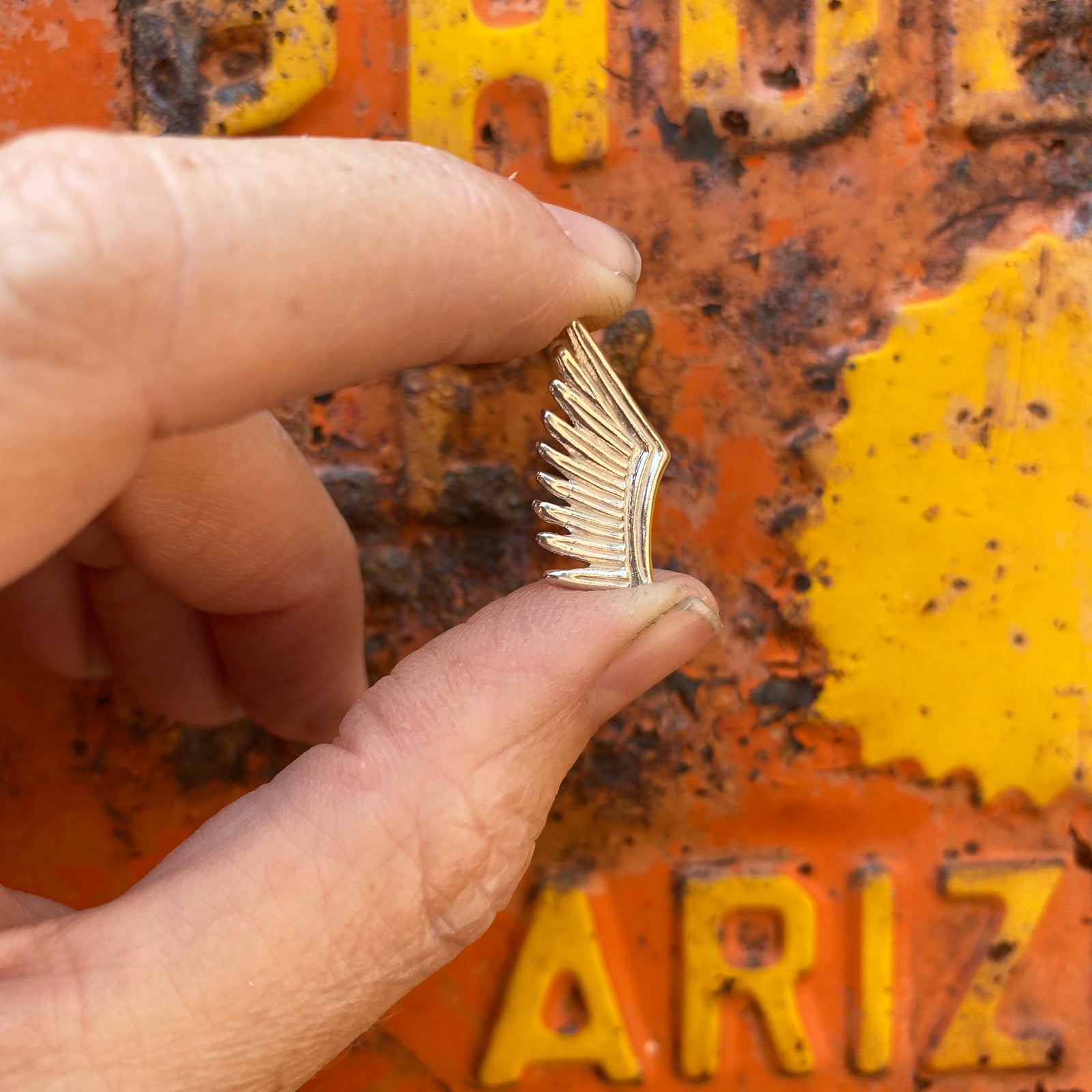sterling silver cast wing