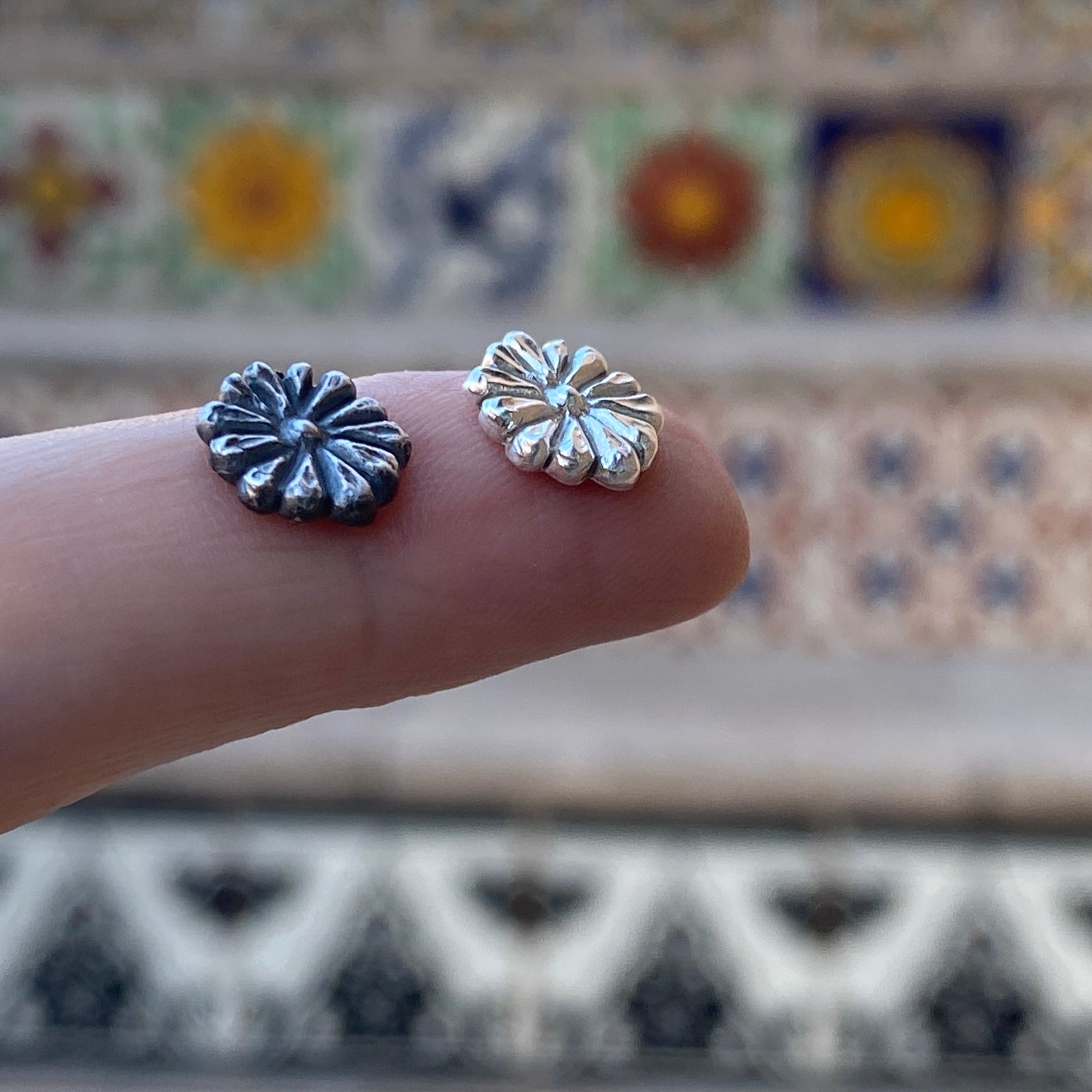cast silver flowers with patina and left shiny