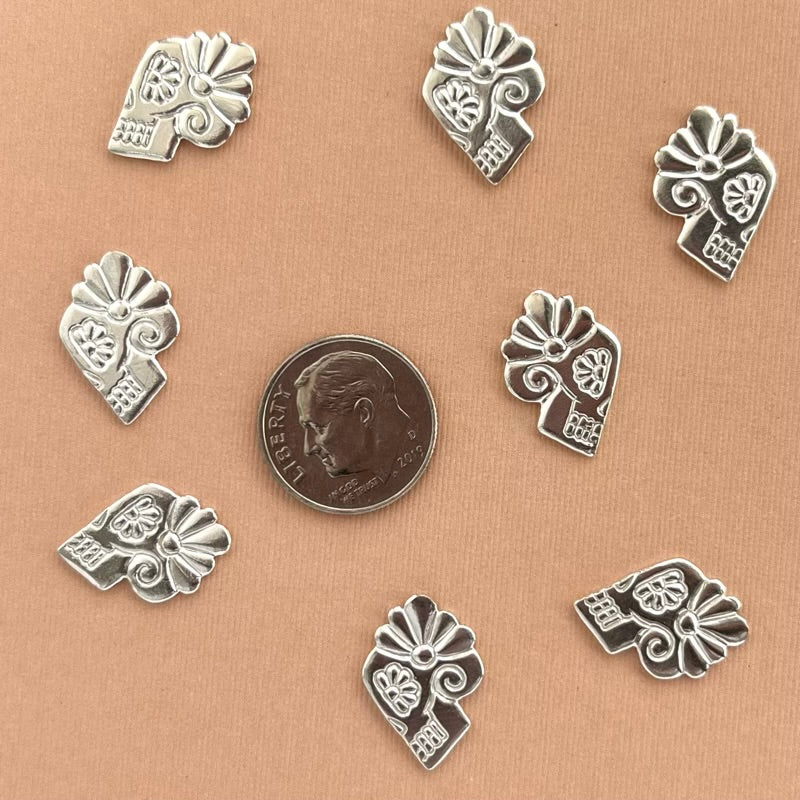 silver she skull casting