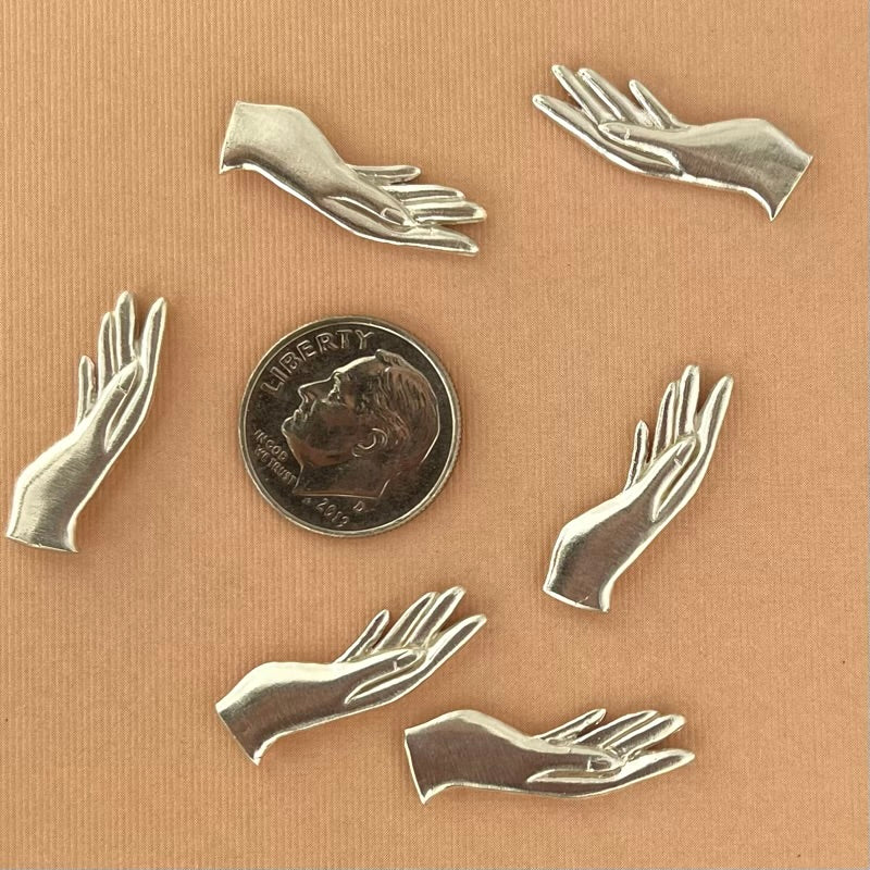 silver hand casting