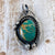 turquoise pendant with badger claw casting 